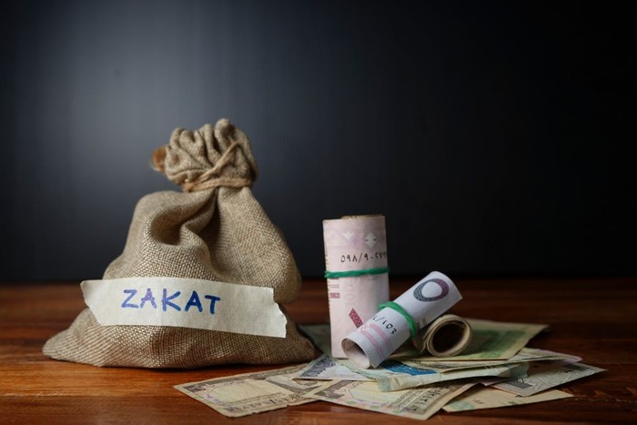 ZAKAT DAN PERANANNYA DALAM MENYEJAHTERAKAN UMAT